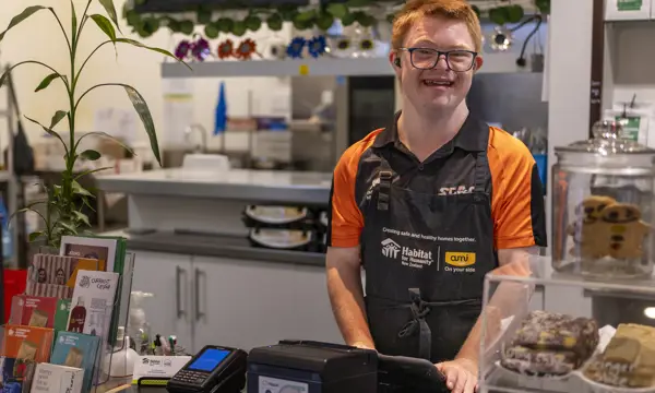 Boy working at a cafe